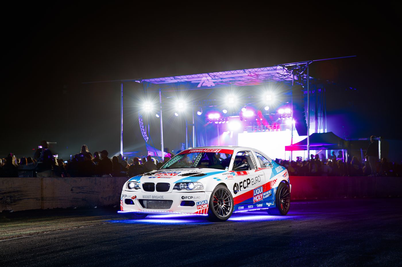 Race car speeding at night